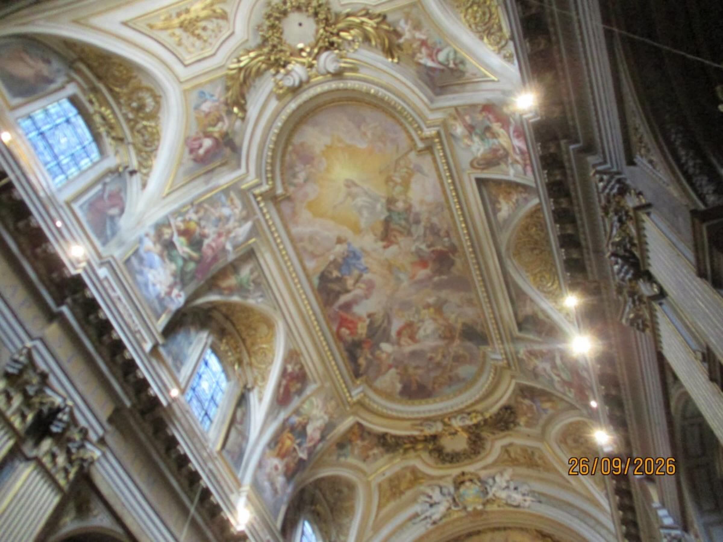 An ornate painted church ceiling