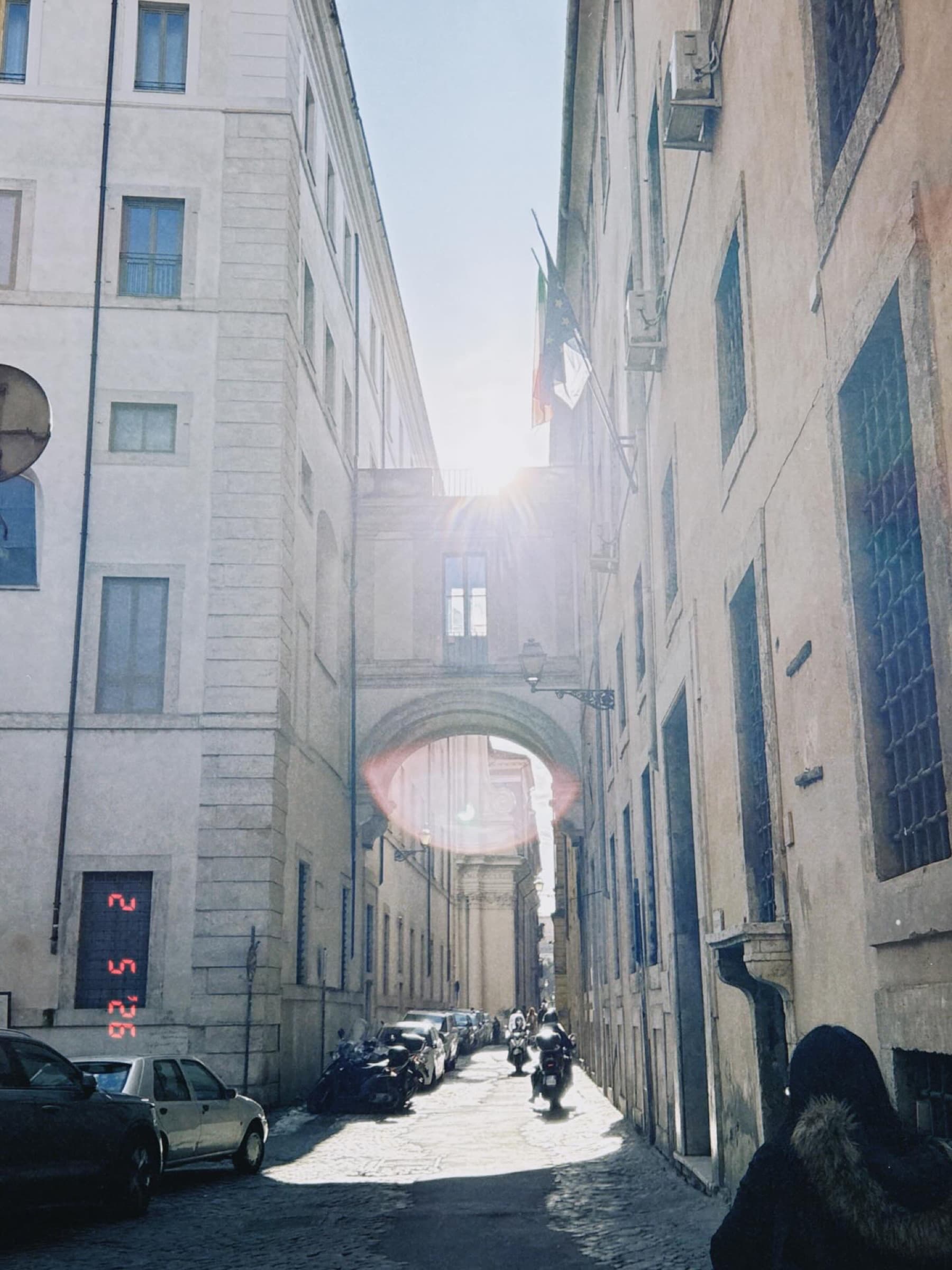 A bright gap between tall buildings